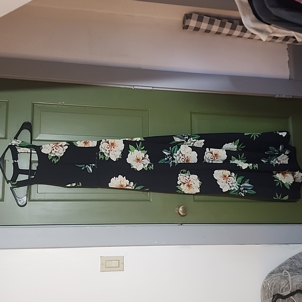 Floral maxi dress with detailed cut outs in front, side slit and tie back detail